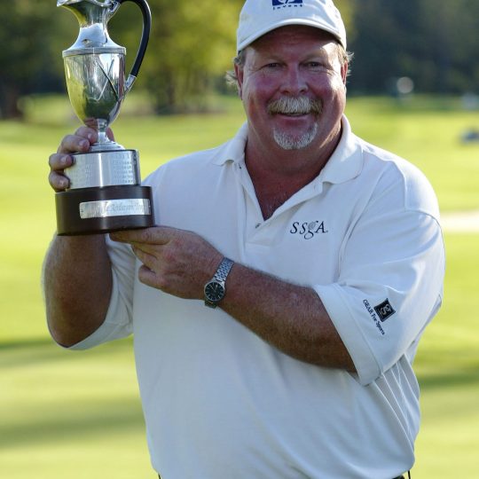 ALOHA, OR - AUGUST 29:  Craig Stadler poses with trophy after his win during the fourth round of the Jeld Wen Tradition at the Reserve Golf Club on August 29, 2004 in Aloha, Oregon.  (Photo by Harry How/Getty Images)